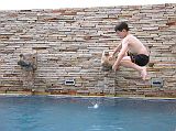 Bangkok 01 03 Buddy Lodge Swimming Pool Peter does his best levitation above the roof-top swimming pool at the Bangkok�s Buddy Lodge.